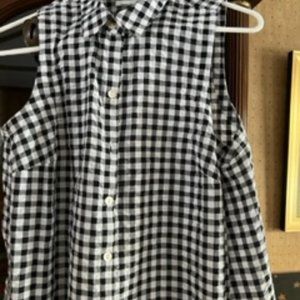 Sleeveless blouse. I got too big for this cute